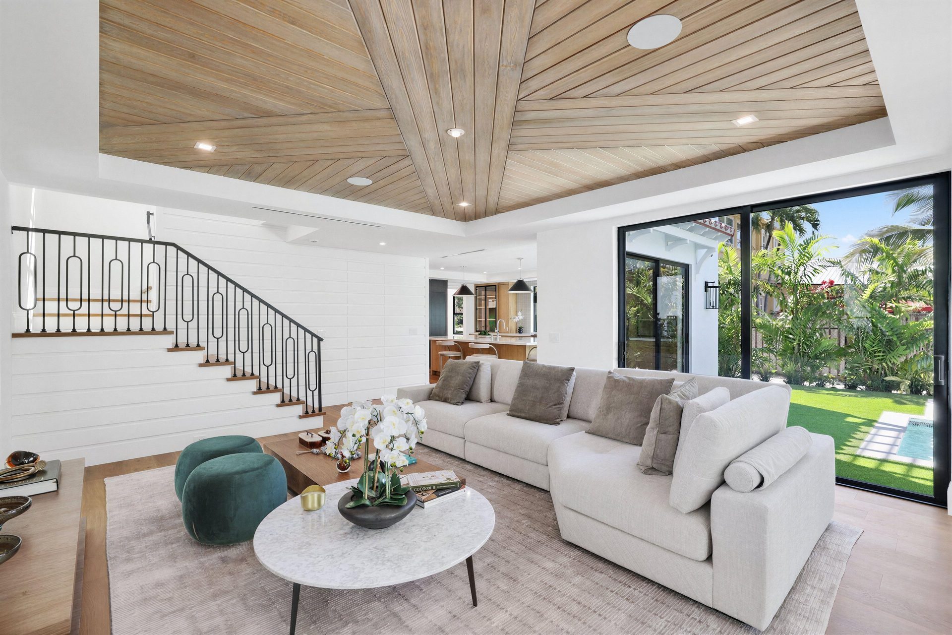 Staged living room with wood ceiling